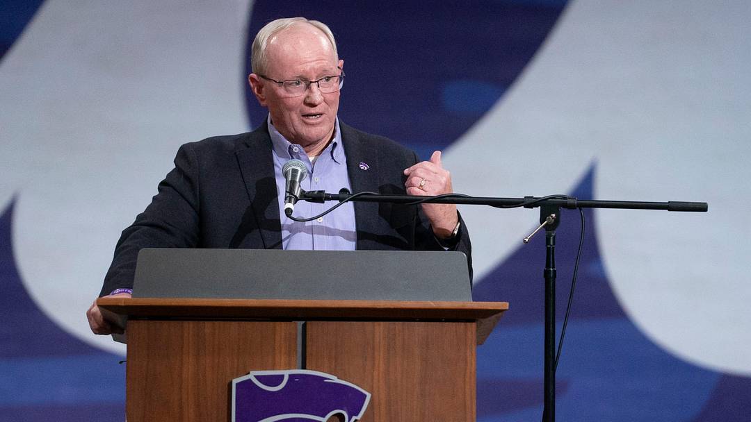 Kansas State athletic director Gene Taylor makes remarks before introducing new head football coach Collin Klein in Morgan Family Arena on Dec. 5, 2025. Kansas State athletic director Gene Taylor makes remarks before introducing new head football coach Collin Klein in Morgan Family Arena on Dec. 5, 2025.