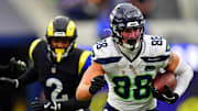 Nov 16, 2025; Inglewood, California, USA; Seattle Seahawks tight end AJ Barner (88) runs with the ball during the second half against the Los Angeles Rams at SoFi Stadium.