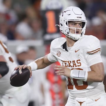 Texas Longhorns quarterback Arch Manning looks to make a pass in the second half against the Georgia Bulldogs at Sanford Stadium.