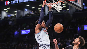 Feb 5, 2025; Brooklyn, New York, USA;  Washington Wizards forward Richaun Holmes (22) dunks past Brooklyn Nets forward Cameron Johnson (2) in the first quarter at Barclays Center. Mandatory Credit: Wendell Cruz-Imagn Images
