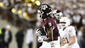 Nov 30, 2024; College Station, Texas, USA; Texas A&M Aggies wide receiver Jahdae Walker (9) receives a pass during the first half against the Texas Longhorns at Kyle Field. Mandatory Credit: Maria Lysaker-Imagn Images 