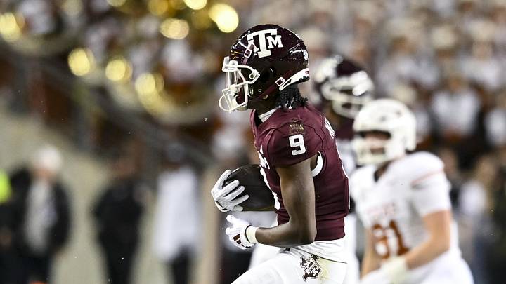 Nov 30, 2024; College Station, Texas, USA; Texas A&M Aggies wide receiver Jahdae Walker (9) receives a pass during the first half against the Texas Longhorns at Kyle Field. Mandatory Credit: Maria Lysaker-Imagn Images 
