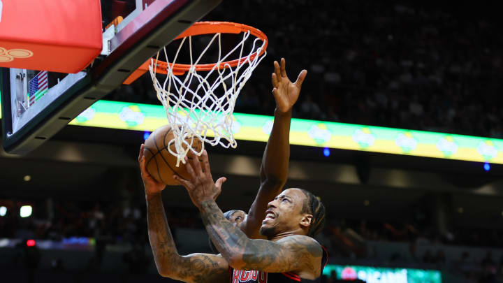 Apr 19, 2024; Miami, Florida, USA; Chicago Bulls forward DeMar DeRozan (11) drives to the basket against Miami Heat center Bam Adebayo (13) in the second quarter during a play-in game of the 2024 NBA playoffs at Kaseya Center. Mandatory Credit: Sam Navarro-USA TODAY Sports Apr 19, 2024; Miami, Florida, USA; Chicago Bulls forward DeMar DeRozan (11) drives to the basket against Miami Heat center Bam Adebayo (13) in the second quarter during a play-in game of the 2024 NBA playoffs at Kaseya Center. Mandatory Credit: Sam Navarro-USA TODAY Sports