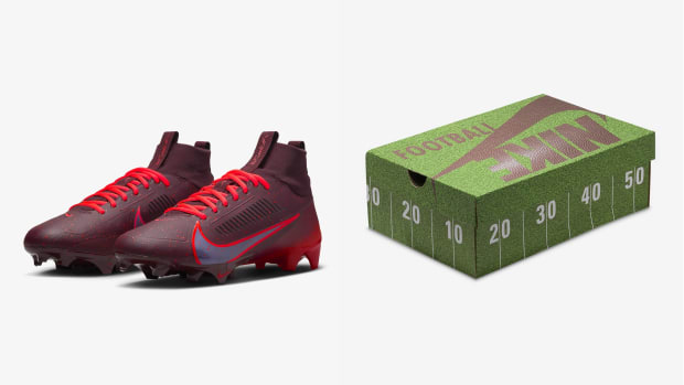 Red Nike football cleats and a green box.