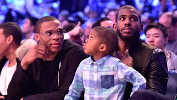 Feb 14, 2015; New York, NY, USA; Oklahoma City Thunder guard Russell Westbrook (left) and Los Angeles Clippers guard Chris Paul (right) during the 2015 NBA All Star Three Point Contest competition at Barclays Center. Mandatory Credit: Bob Donnan-Imagn Images