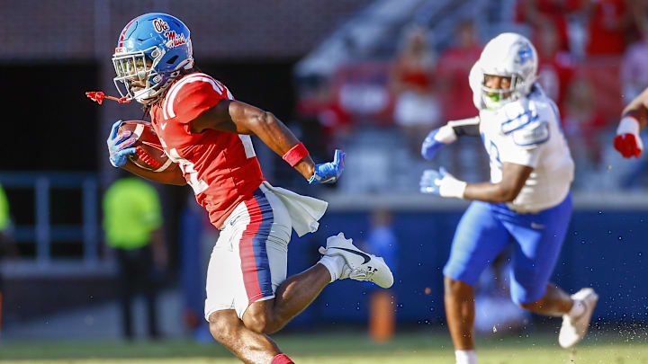 Sep 7, 2024; Oxford, Mississippi, USA; Mississippi Rebels running back Henry Parrish Jr. (21) runs the ball during the second half  against the Middle Tennessee Blue Raiders at Vaught-Hemingway Stadium. Mandatory Credit: Petre Thomas-Imagn Images