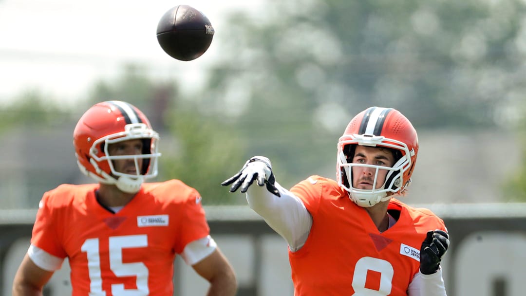 Cleveland Browns quarterback Kenny Pickett (8) throws as quarterback Joe Flacco (15) looks on during NFL training camp at CrossCountry Mortgage Campus, Friday, Aug. 1, 2025, in Berea, Ohio.
