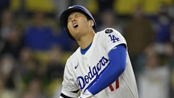 Los Angeles Dodgers designated hitter Shohei Ohtani (17) reacts