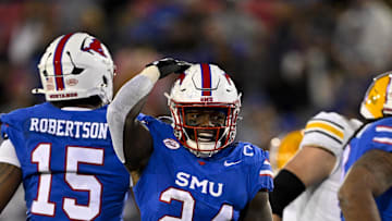 Nov 30, 2024; Dallas, Texas, USA; Southern Methodist Mustangs linebacker Kobe Wilson (24) in action during the game between the SMU Mustangs and the California Golden Bears at Gerald J. Ford Stadium. Mandatory Credit: Jerome Miron-Imagn Images