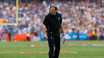 Oct 4, 2025; Gainesville, Florida, USA; Florida Gators head coach Billy Napier inspects the line of scrimmage against the Texas Longhorns during the first half at Ben Hill Griffin Stadium. Mandatory Credit: Matt Pendleton-Imagn Images
