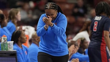 Mar 7, 2025; Greenville, SC, USA; Ole Miss Rebels head coach Yolett McPhee-McCuin reacts to closing the scoring gap against Texas Longhorns during the second half at Bon Secours Wellness Arena. Mandatory Credit: Jim Dedmon-Imagn Images