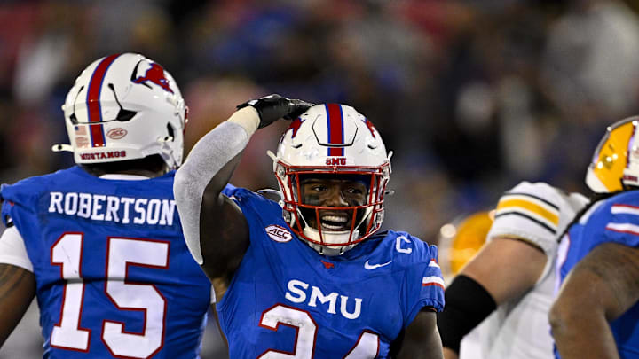 Nov 30, 2024; Dallas, Texas, USA; Southern Methodist Mustangs linebacker Kobe Wilson (24) in action during the game between the SMU Mustangs and the California Golden Bears at Gerald J. Ford Stadium. Mandatory Credit: Jerome Miron-Imagn Images