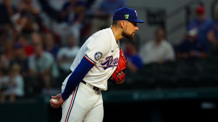 Aug 17, 2024; Arlington, Texas, USA;  Texas Rangers starting pitcher Nathan Eovaldi (17) throws  against the Minnesota Twins during the first inning  at Globe Life Field. Mandatory Credit: Kevin Jairaj-USA TODAY Sports