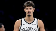 Nov 3, 2025; Brooklyn, New York, USA; Brooklyn Nets guard Ben Saraf (77) during a game against the Minnesota Timberwolves at Barclays Center. Mandatory Credit: John Jones-Imagn Images
