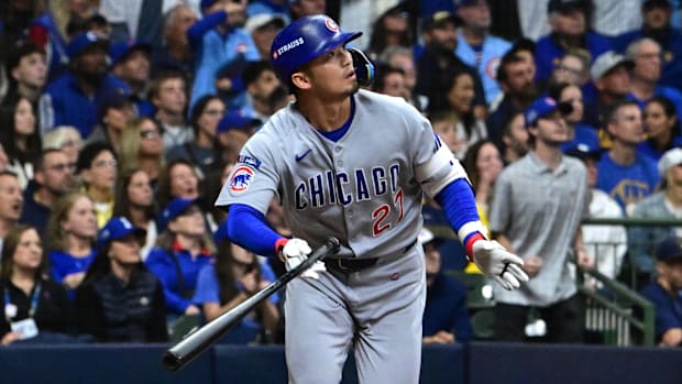 Seiya Suzuki of Chicago Cubs hits home run and drops bat Seiya Suzuki of Chicago Cubs hits home run and drops bat