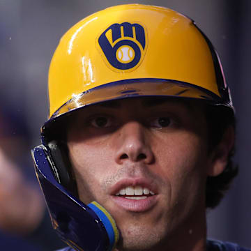 Milwaukee Brewers left fielder Christian Yelich (22) celebrates with teammates after scoring a run against the Atlanta Braves in the third inning at Truist Park on Aug. 5. 