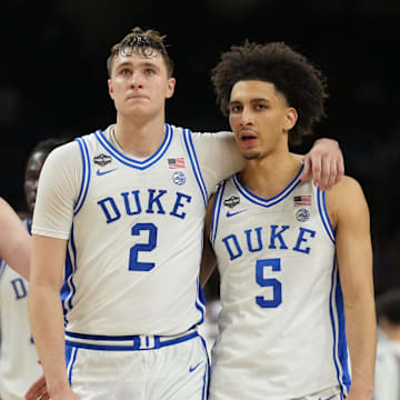 Duke Blue Devils forward Cooper Flagg, guard Tyrese Proctor and guard Kon Knueppel react during the Final Four.