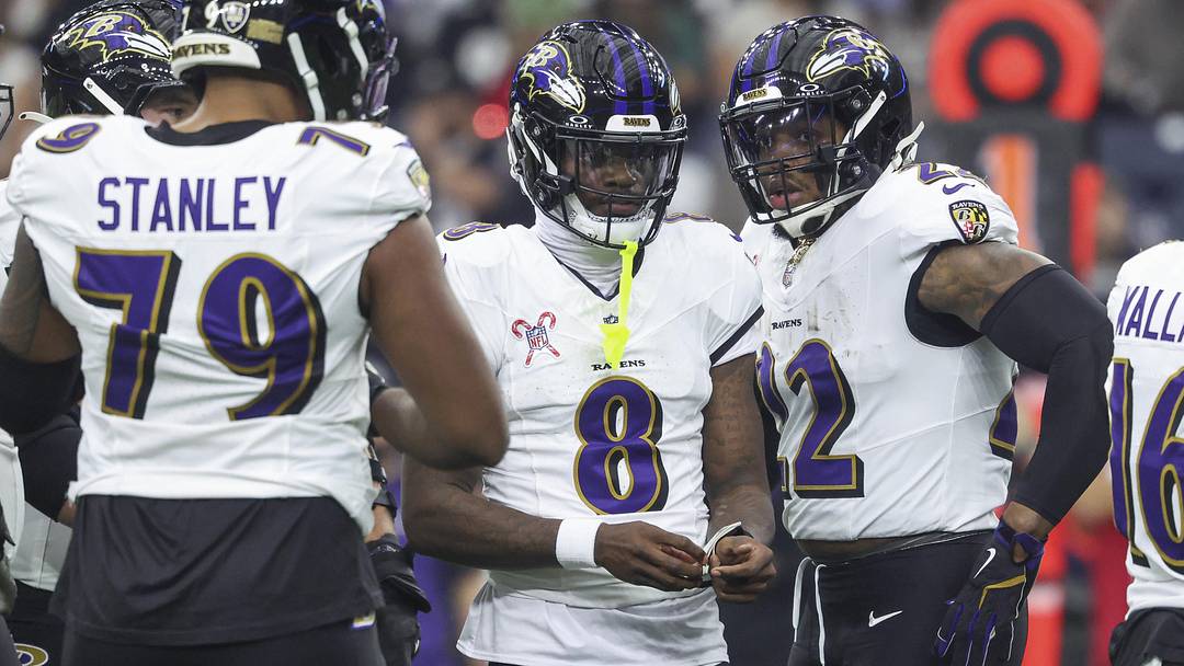 Dec 25, 2024; Houston, Texas, USA;  Baltimore Ravens quarterback Lamar Jackson (8) and running back Derrick Henry (22) before a play during the game against the Houston Texans at NRG Stadium. Mandatory Credit: Troy Taormina-Imagn Images