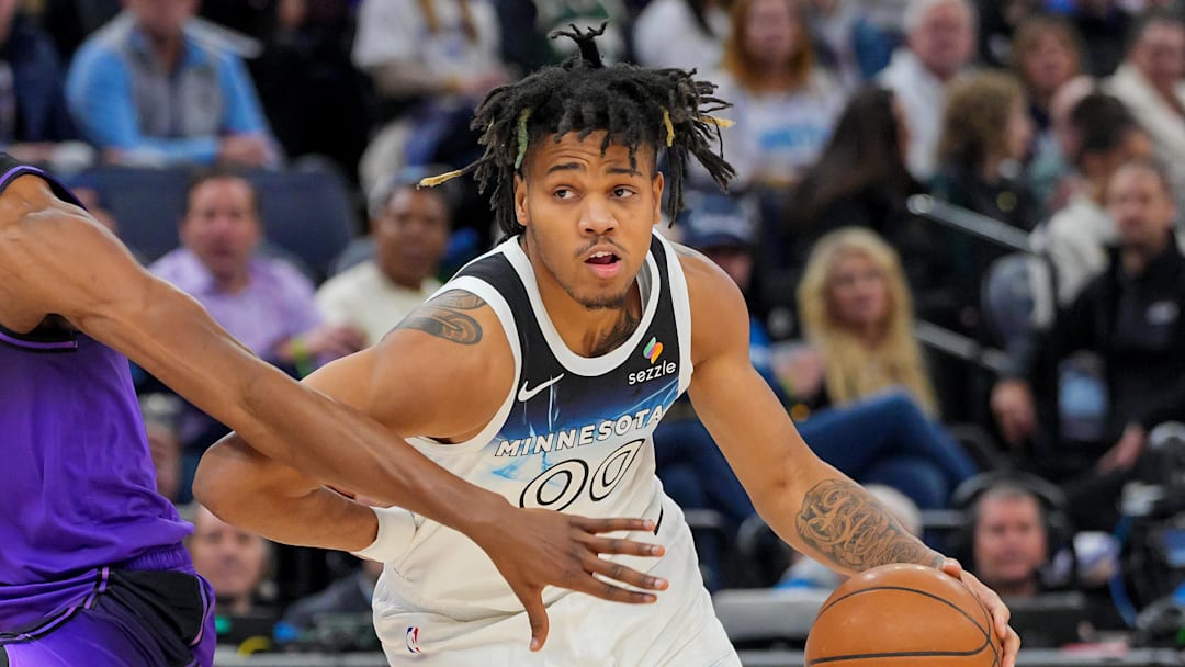 Dec 2, 2024; Minneapolis, Minnesota, USA; Minnesota Timberwolves guard Terrence Shannon Jr. (00) dribbles against the Los Angeles Lakers in the fourth quarter at Target Center. Mandatory Credit: Brad Rempel-Imagn Images