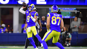 Nov 11, 2024; Inglewood, California, USA; Los Angeles Rams quarterback Matthew Stafford (9) throws against the Miami Dolphins during the second half at SoFi Stadium. Mandatory Credit: Gary A. Vasquez-Imagn Images