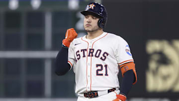 Houston Astros designated hitter Yainer Diaz (21) reacts after hitting a double during the fourth inning against the Texas Rangers at Daikin Park. 