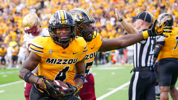 Sep 14, 2024; Columbia, Missouri, USA; Missouri Tigers safety Tre'Vez Johnson (4) celebrates after an interception against the Boston College Eagles during the first half at Faurot Field at Memorial Stadium. Mandatory Credit: Denny Medley-Imagn Images