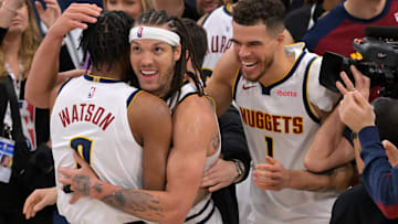 Apr 26, 2025; Inglewood, California, USA; Denver Nuggets forward Aaron Gordon (32) is congratulated by forward Peyton Watson (8) and forward Michael Porter Jr. (1) after the game winning dunk to defeat the Los Angeles Clippers 101-99 in game four of round one of the 2024 NBA Playoffs at Intuit Dome. Mandatory Credit: Jayne Kamin-Oncea-Imagn Images