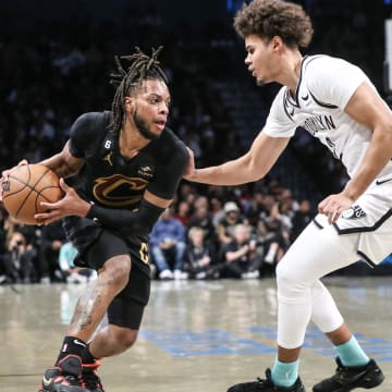 Mar 23, 2023; Brooklyn, New York, USA;  Cleveland Cavaliers guard Darius Garland (10) looks to drive past Brooklyn Nets forward Cameron Johnson (2) in the second quarter at Barclays Center. Mandatory Credit: Wendell Cruz-USA TODAY Sports
