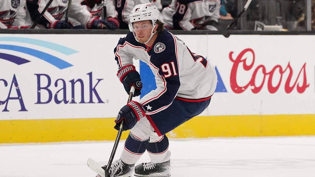 Jan 6, 2026; San Jose, California, USA;  Columbus Blue Jackets center Kent Johnson (91) controls the puck against the San Jose Sharks in the first period at SAP Center at San Jose. Mandatory Credit: David Gonzales-Imagn Images