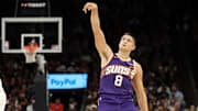 Nov 10, 2025; Phoenix, Arizona, USA; Phoenix Suns guard Grayson Allen (8) shoots a three pointer against the New Orleans Pelicans in the second half at the Mortgage Matchup Center. Mandatory Credit: Mark J. Rebilas-Imagn Images
