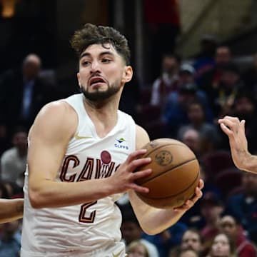 Oct 12, 2023; Cleveland, Ohio, USA; Cleveland Cavaliers guard Ty Jerome (2) drives to the basket against Orlando Magic guard Jett Howard (13) during the second half at Rocket Mortgage FieldHouse. Mandatory Credit: Ken Blaze-Imagn Images