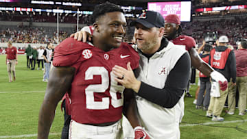 Sep 7, 2024; Tuscaloosa, Alabama, USA;  Alabama Crimson Tide running back Jam Miller (26) celebrates with defensive coordinator Kane Wommack as he leaves the field after defeating the South Florida Bulls at Bryant-Denny Stadium. Mandatory Credit: Gary Cosby Jr.-Imagn Images