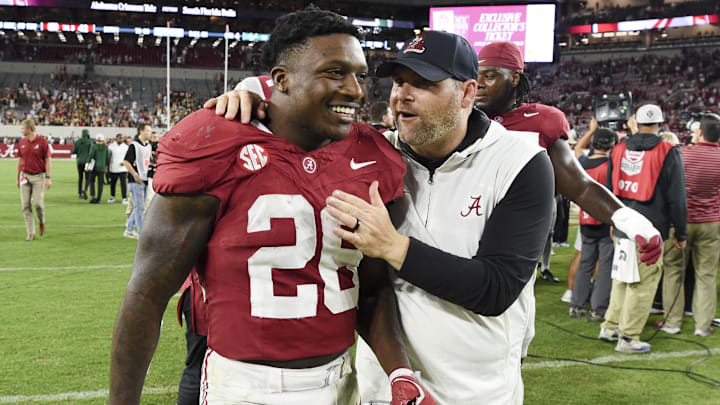 Sep 7, 2024; Tuscaloosa, Alabama, USA;  Alabama Crimson Tide running back Jam Miller (26) celebrates with defensive coordinator Kane Wommack as he leaves the field after defeating the South Florida Bulls at Bryant-Denny Stadium. Mandatory Credit: Gary Cosby Jr.-Imagn Images