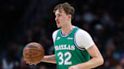 Nov 10, 2025; Dallas, Texas, USA;  Dallas Mavericks forward Cooper Flagg (32) dribbles during the third quarter against the Milwaukee Bucks at American Airlines Center. Mandatory Credit: Kevin Jairaj-Imagn Images
