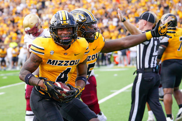 Missouri Tigers safety Tre'Vez Johnson (4) celebrates after an interception against the Boston College Eagles.