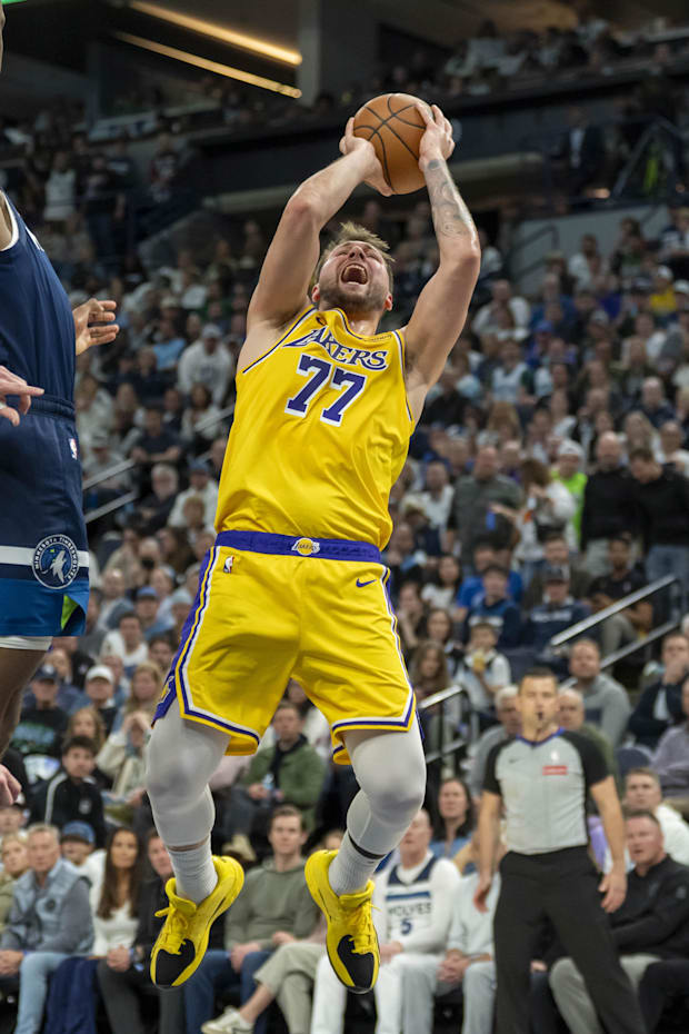 Los Angeles Lakers guard Luka Doncic shoots the ball against the Minnesota Timberwolves