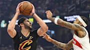 Oct 31, 2025; Cleveland, Ohio, USA; Cleveland Cavaliers forward Larry Nance Jr. (22) looks to shoot beside Toronto Raptors forward Brandon Ingram (3) in the first quarter at Rocket Arena. Mandatory Credit: David Richard-Imagn Images