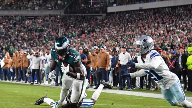 hiladelphia Eagles wide receiver A.J. Brown (11) scores a touchdown against Dallas Cowboys cornerback DaRon Bland 