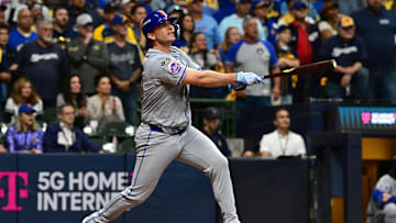 Oct 3, 2024; Milwaukee, Wisconsin, USA; New York Mets first baseman Pete Alonso (20) hits a three run home run against the Milwaukee Brewers in the ninth inning during game three of the Wildcard round for the 2024 MLB Playoffs at American Family Field. Mandatory Credit: Benny Sieu-Imagn Images