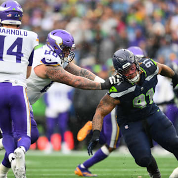 Dec 22, 2024; Seattle, Washington, USA; Minnesota Vikings guard Dalton Risner (66) blocks Seattle Seahawks defensive tackle Byron Murphy II (91) during the first half at Lumen Field. 