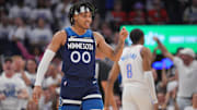 May 24, 2025; Minneapolis, Minnesota, USA; Minnesota Timberwolves guard Terrence Shannon Jr. (00) reacts against the Oklahoma City Thunder during the first half in game three of the western conference finals for the 2025 NBA Playoffs at Target Center. Mandatory Credit: Brad Rempel-Imagn Images
