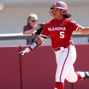 Oklahoma's Ella Parker (5) celebrates a home run in the sixth inning during the Norman Regional NCAA tournament game between the Oklahoma Sooners and the Oregon Ducks at Love's Field in Norman, Okla. Saturday, May, 18, 2024.