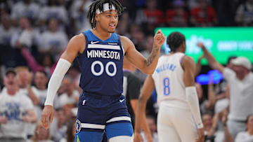 May 24, 2025; Minneapolis, Minnesota, USA; Minnesota Timberwolves guard Terrence Shannon Jr. (00) reacts against the Oklahoma City Thunder during the first half in game three of the western conference finals for the 2025 NBA Playoffs at Target Center. Mandatory Credit: Brad Rempel-Imagn Images