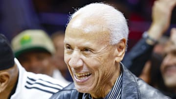 Former Seattle Supersonics head coach Lenny Wilkens acknowledges the fans.