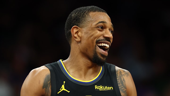Feb 5, 2026; Phoenix, Arizona, USA; Golden State Warriors guard De'Anthony Melton (8) reacts against the Phoenix Suns in the second half at Mortgage Matchup Center. Mandatory Credit: Mark J. Rebilas-Imagn Images