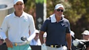 Sep 20, 2024; Carrolton, Texas, USA; Phil Mickelson walks behind Carlos Ortiz on the tenth fairway during the LIV Golf Dallas Team Championship at Maridoe Golf Club. Mandatory Credit: Jim Cowsert-Imagn Images