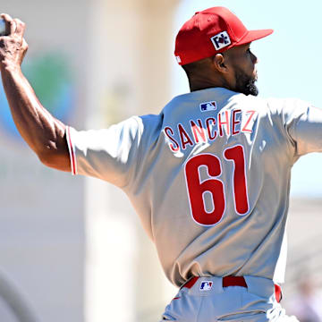Mar 18, 2025; Bradenton, Florida, USA; Philadelphia Phillies starting pitcher Christopher Sanchez (61) throws a pitch in the first inning against the Pittsburgh Pirates during spring training at LECOM Park. 