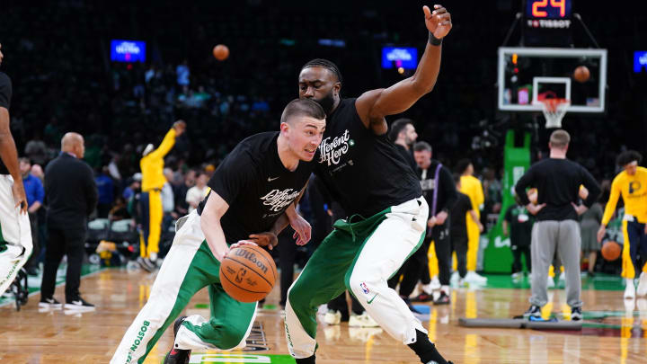 Boston Celtics teammates Payton Pritchard, left, and Jaylen Brown practice before a 2024 playoff game. 