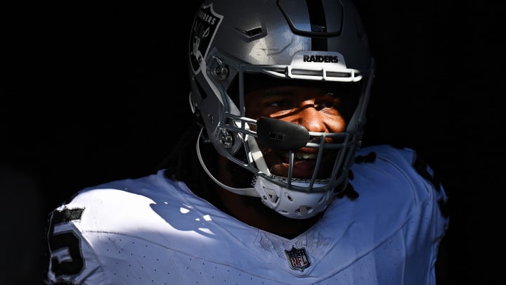 Oct 22, 2023; Chicago, Illinois, USA;  Las Vegas Raiders defensive tackle John Jenkins (95) takes the field to warm up before a game against the Chicago Bears at Soldier Field. Mandatory Credit: Jamie Sabau-USA TODAY Sports