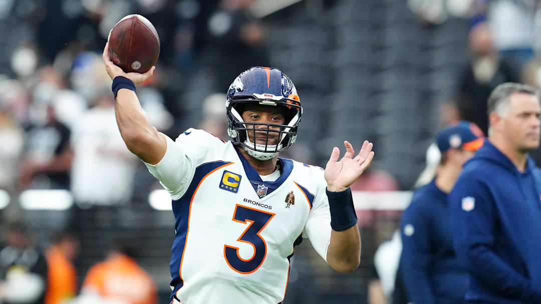 Jan 7, 2024; Paradise, Nevada, USA; Denver Broncos quarterback Russell Wilson (3) warms up before a game against the Las Vegas Raiders at Allegiant Stadium. Mandatory Credit: Stephen R. Sylvanie-Imagn Images